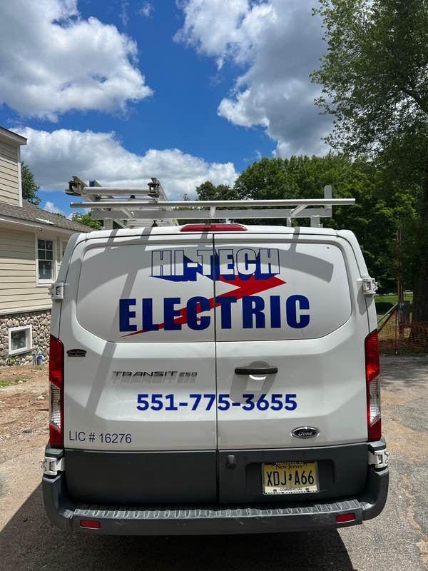 Hi Tech Electric technician on the job